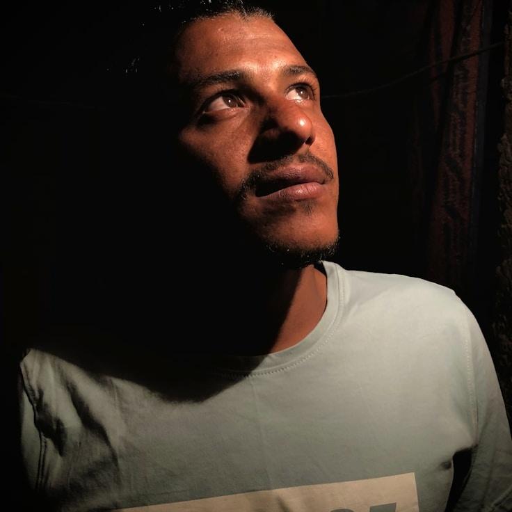 Kaveri Mehta, Lead Design Curator at Harvest Studio Portal, reviewing corporate floral arrangements